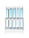 Test tubes with blue liquid isolated. Laboratory glassware Royalty Free Stock Photo