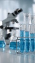 Test Tubes with Blue Liquid Microscope Science Lab Royalty Free Stock Photo