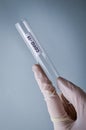 Test tubes closeup, medical glassware with covid-19 label Royalty Free Stock Photo