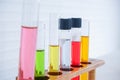 Test tubes with colorful chemicals in Laboratory room