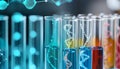 Test tubes with different illustrations of DNA in laboratory, closeup Royalty Free Stock Photo