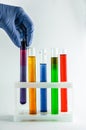 Test tubes with multi-colored reagents on a white background. chemistry Royalty Free Stock Photo