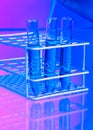 Test tubes, pipette and mixing solutions Royalty Free Stock Photo