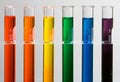 Test tubes with rainbow colors Royalty Free Stock Photo