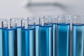 Test tubes with reagents on background, closeup. Laboratory analysis