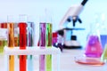 Test tubes with samples in rack on table, space for text. Solution chemistry Royalty Free Stock Photo