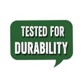 Tested for durability green speech bubble quality assurance testing stamp sign Royalty Free Stock Photo