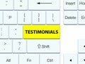 Testimonials yellow keyboard button Royalty Free Stock Photo