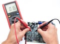 Testing circuit with digital multimeter Royalty Free Stock Photo