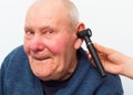 Testing Elderly Patient's Hearing With Auroscope