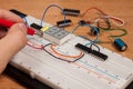 Testing electrical circuit on breadboard Royalty Free Stock Photo