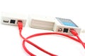 Testing of a long red network cable Royalty Free Stock Photo