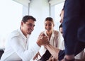 Testing their strengths as competitive business players. two businessmen arm wrestling in an office. Royalty Free Stock Photo