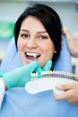 Testing whiteness of teeth of a patient Royalty Free Stock Photo