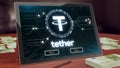 Tether cryptocurrency logo on the pc tablet display. 3D illustration