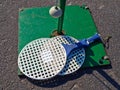 Tetherball Totem Tennis Ball attached to a green metal pole