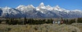 Teton Mountains with tourists looking