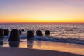 Tetrapods at the beach of Sylt Island at sunset