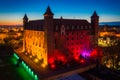 Teutonic castle in Gniew town illuminated at night, Poland