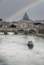 The Tevere river with a rainbow over the dome of the Basilica of San Pietro in background Royalty Free Stock Photo