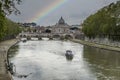 The Tevere river with a rainbow over the dome of the Basilica of San Pietro in background Royalty Free Stock Photo