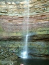 Young girl at base of Tews Falls, Spencer Gorge Conservations Area, Ontario, Canada Royalty Free Stock Photo