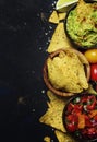 Tex-Mex Concept, Nachos, Guacamole, Salsa Sauce, Black Background, Top View