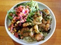 Tex-Mex shrimp salad with guacamole, salsa and tortilla strips