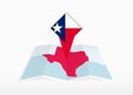 Texas is depicted on a folded paper map and pinned location marker with flag of Texas Royalty Free Stock Photo