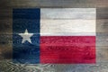 Texas flag on rustic old wood surface background Royalty Free Stock Photo