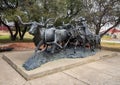 `Texas Gold` by sculptor T.D. Kelsey located in the famous Forth Worth Stockyards in Texas.