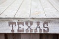 Texas inscription on wooden plate