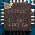 Texas Instruments &#x28;TI&#x29; CC2500 Low-Power 2.4GHz RF Transceiver Chip On A Blue Circuit Board