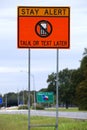 Texas road sign warning about cellphones Royalty Free Stock Photo