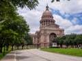 The Texas State Capitol with waving American and Texan flags on a sunny summer day in Austin, Texas, USA Royalty Free Stock Photo