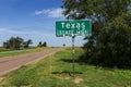 A Texas State Line sign along the route 66 near the town of Texola State of Oklahoma, USA Royalty Free Stock Photo