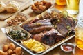 Texas style bbq tray with smoked brisket, st louis ribs, pulled pork, chicken, hot links, and sides Royalty Free Stock Photo