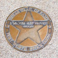 texas trail of fame honors cowboy Booger Red Privett with a plate at walk of fame in Fort Worth