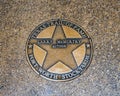 Texas Trail of Fame star honoring the author Larry McMurtry at the Fort Worth Stockyards in Texas. Royalty Free Stock Photo