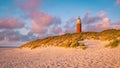 Texel lighthouse during sunset Netherlands Dutch Island Texel Royalty Free Stock Photo