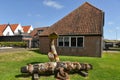 Texel, Netherlands. August 2022. An original sheep barn with an old and rusty ship's anchor at museum Kaap Skil in Royalty Free Stock Photo