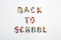 Text Back To School made of colourful number beads on white background. Back to school concept. Royalty Free Stock Photo