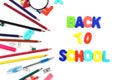 Lettering back to school with stationery on white background Royalty Free Stock Photo