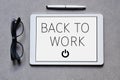 Text back to work in a tablet computer Royalty Free Stock Photo