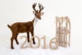 2016 text background winter deer and sledge