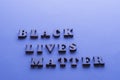 Text Black Lives Matter on blue background with. Concept of Discrimination, racial problems