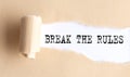 The text break the rules appears on a torn paper on white background Royalty Free Stock Photo