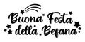 Text Buona festa della Befana - Italian translation - happy Epiphany party. ink lettering decorated with stars and comet symbols.