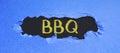 Text caption presenting Bbq. Word for usually done outdoors by smoking meat over wood or charcoal