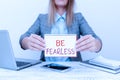 Text caption presenting Be Fearless. Conceptual photo act of striving to lead an extraordinary life and make a